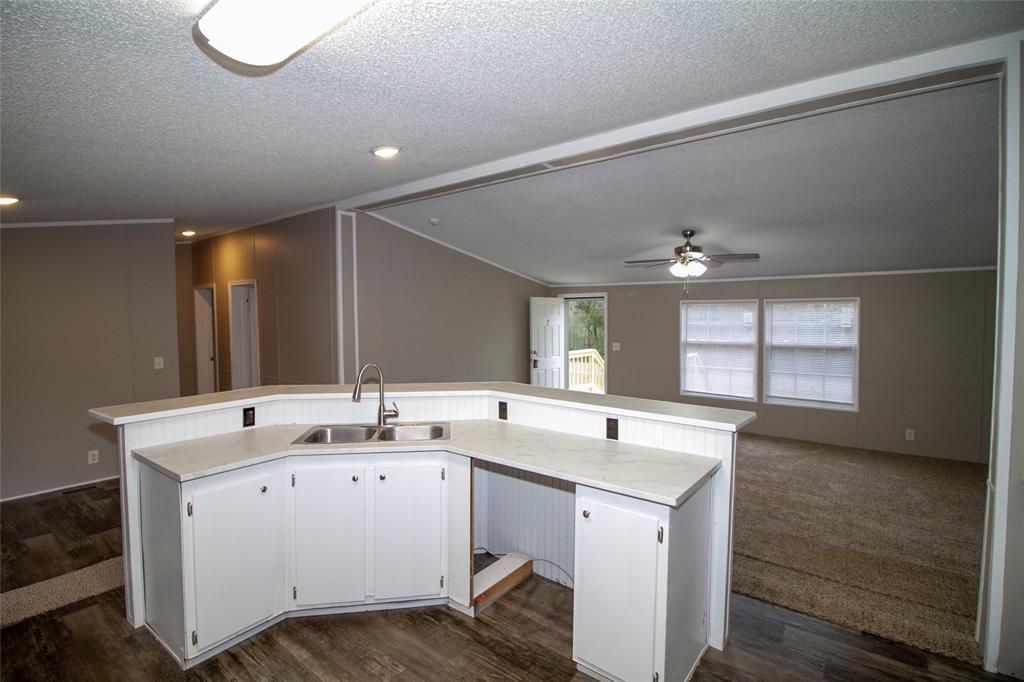 909 Old Arcadia Road Minden, LA 71055 - Photo 9 of 21 a bathroom with a sink and a mirror