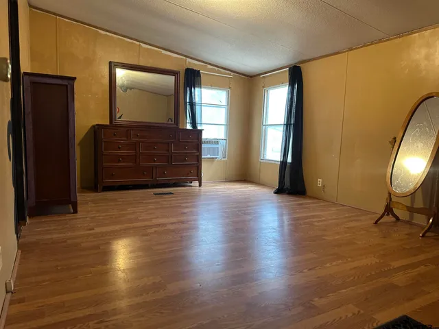 a view of livingroom with furniture and window