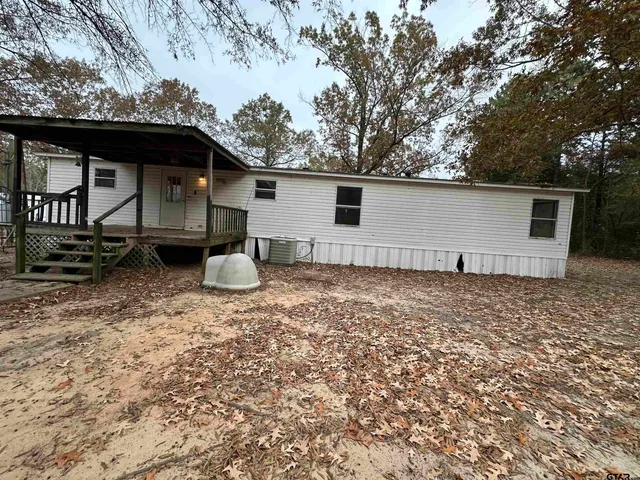 a outdoor space with lots of furniture and appliances