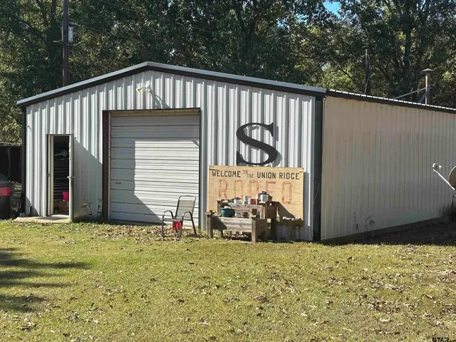 a room with painting and a table
