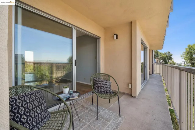 a view of a balcony with an outdoor space