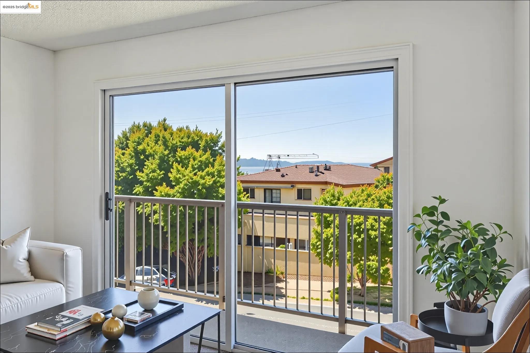 2 Panoramic Way, Unit 105 Berkeley, CA 94704 - Photo 9 of 20 a living room with furniture and a window