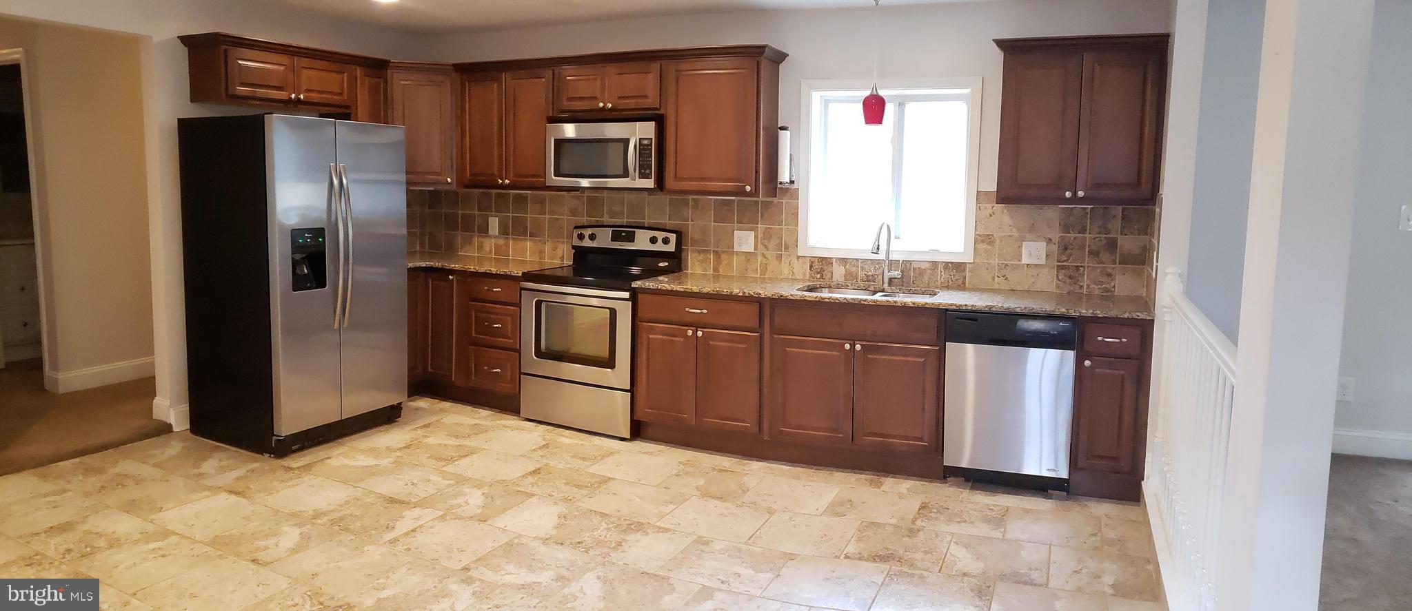 121 Talbot Road Stevensville, MD 21666 - Photo 12 of 12 Large open remodeled kitchen with Granite