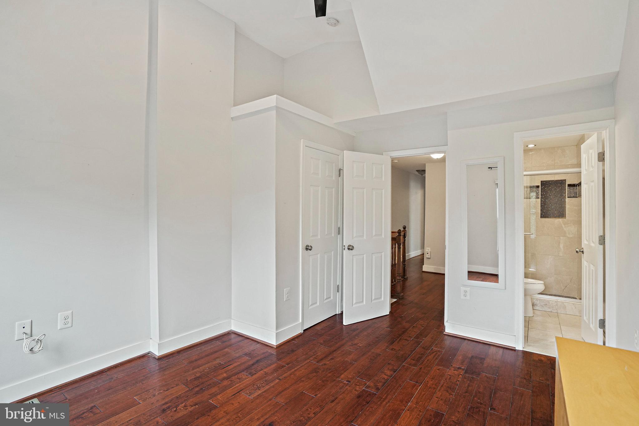 2012 2nd Street Northwest Washington, DC 20001 - Photo 5 of 9 a view of an empty room with wooden floor