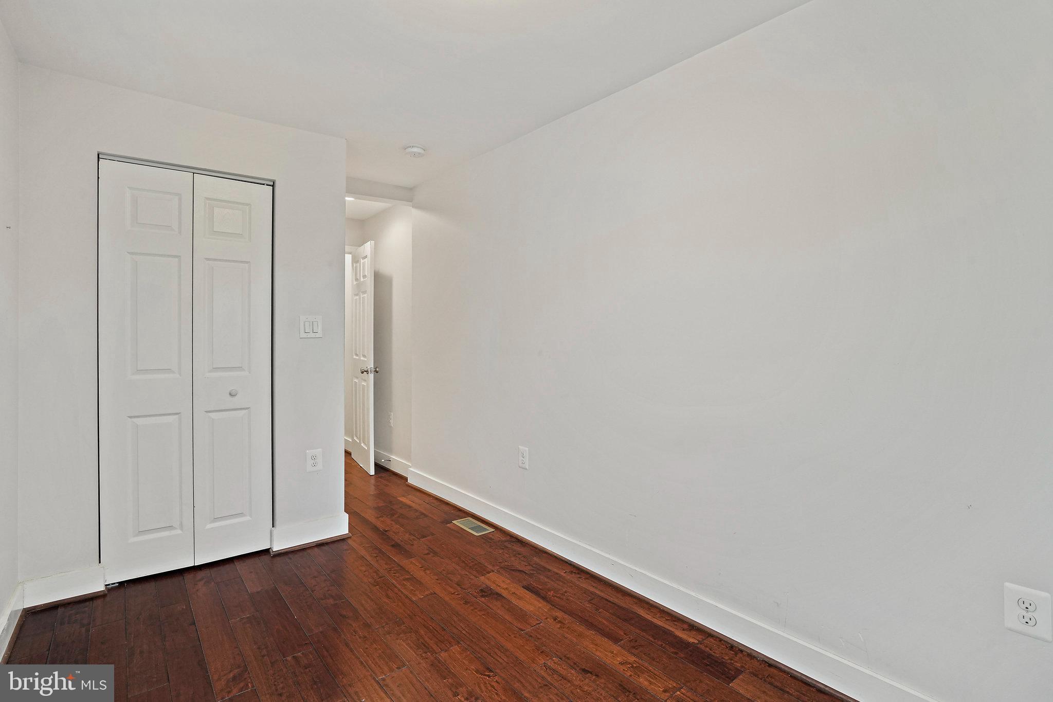 2012 2nd Street Northwest Washington, DC 20001 - Photo 9 of 9 a view of an empty room with wooden floor and closet
