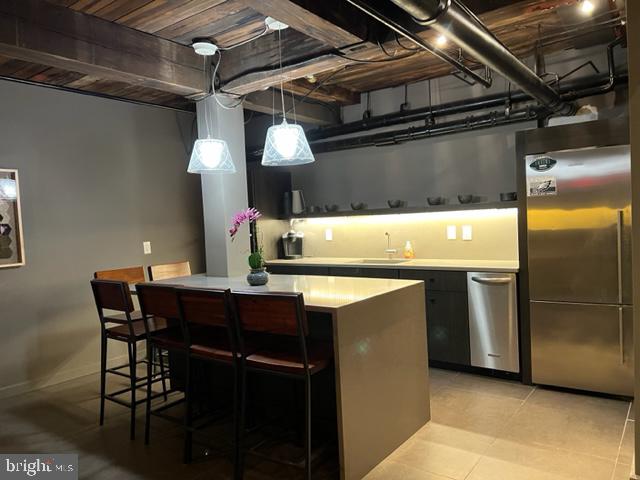 105 South 18th Street, Unit 4A Philadelphia, PA 19103 - Photo 18 of 18 Social Room Kitchen