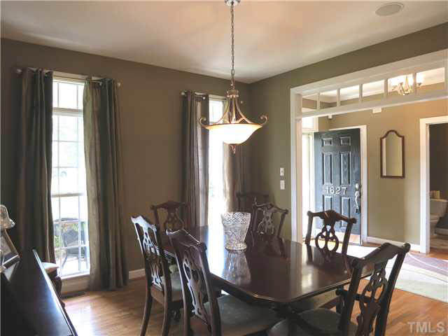 1627 Weatherford Circle Raleigh, NC 27604 - Photo 5 of 25 The formal Dining Rm is off the Foyer and features a pewter light fixture. Dining Room