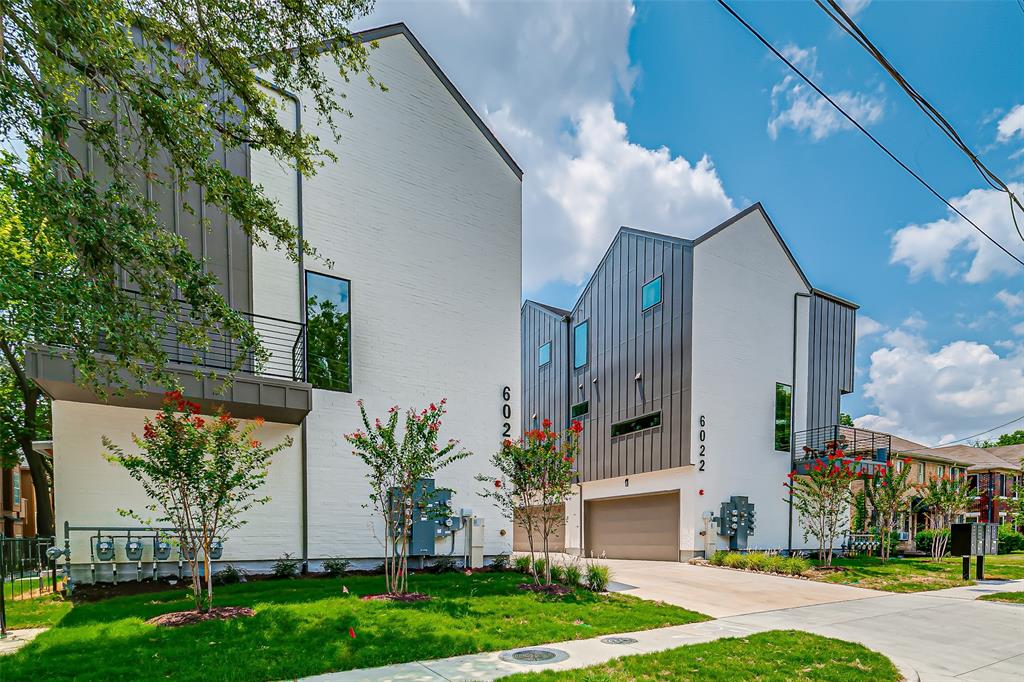 6028 Lewis Street, Unit 202 Dallas, TX 75206 - Photo 2 of 37 a view of a white house with a yard and a large tree