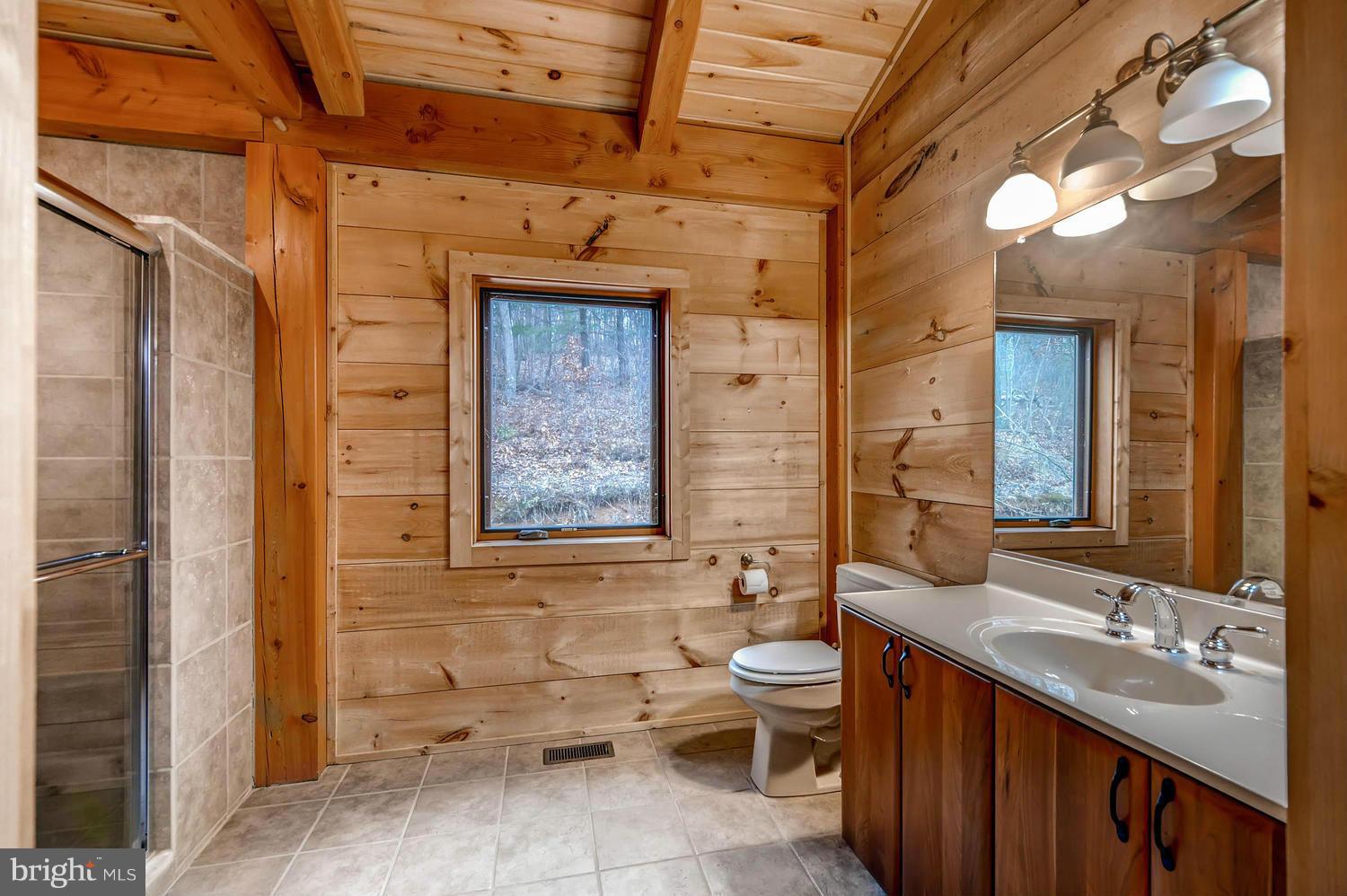 721 Lees Mill Road Upperco, MD 21155 - Photo 7 of 16 a bathroom with a toilet sink and mirror
