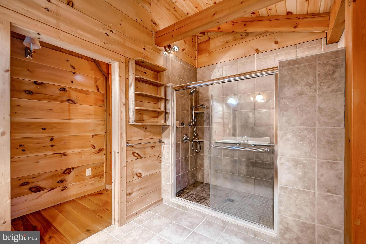 721 Lees Mill Road Upperco, MD 21155 - Photo 8 of 16 a bathroom with a glass door shower