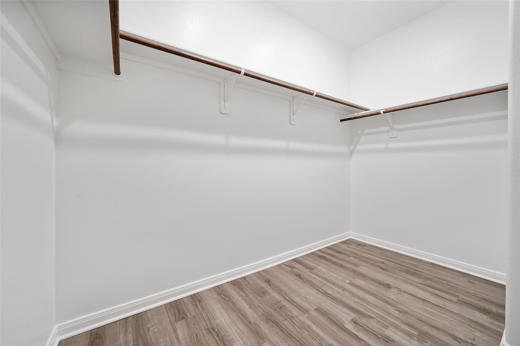 222 Spruce Lake Road Houston, TX 77336 - Photo 18 of 21 a view of a room with wooden floor