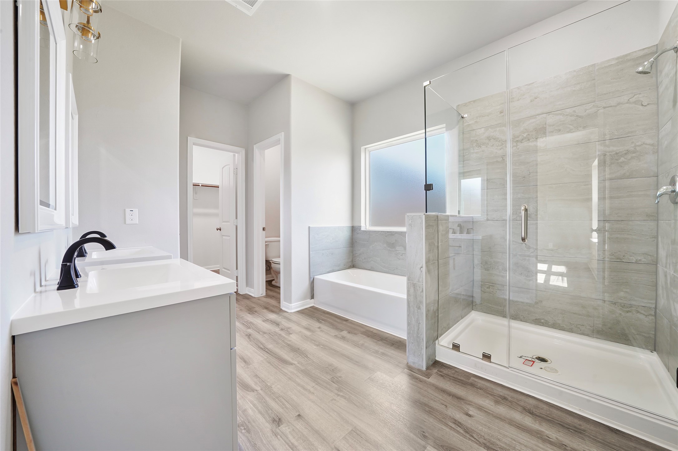 222 Spruce Lake Road Houston, TX 77336 - Photo 20 of 21 a bathroom with a tub sink and mirror