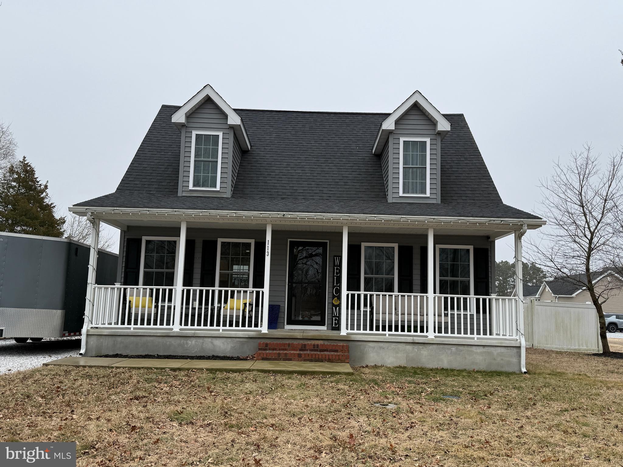 113 State Street Sharptown, MD 21861 - Photo 18 of 18 a front view of a house with a garden