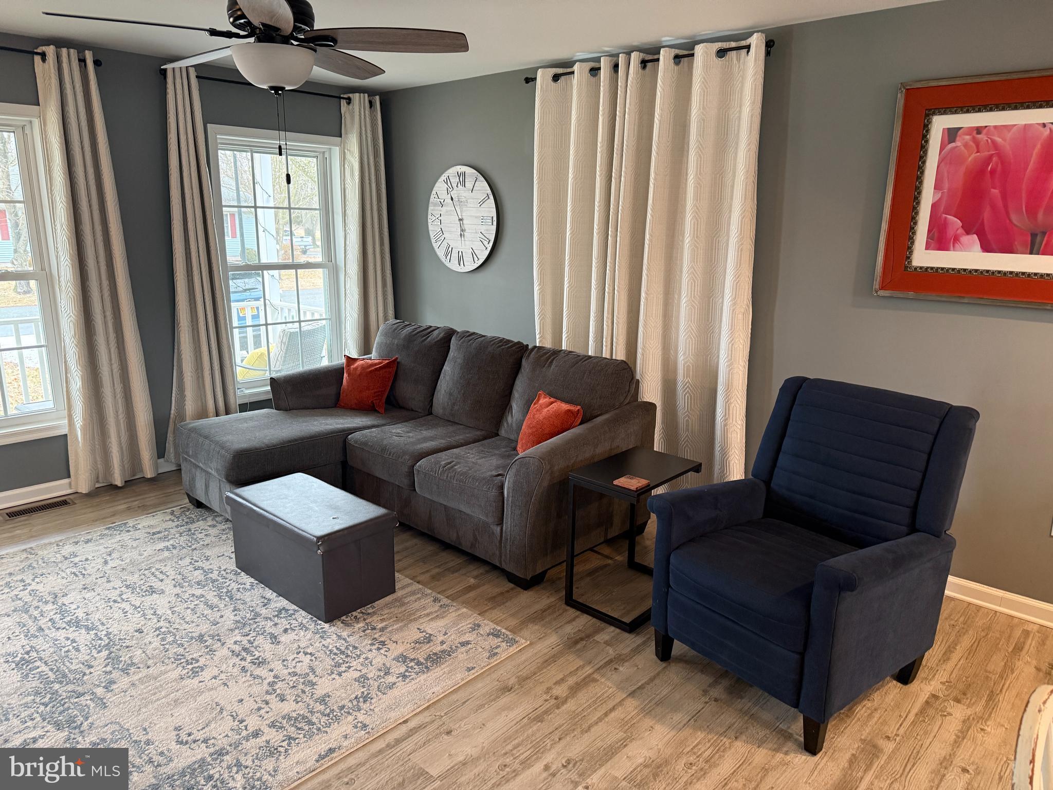 113 State Street Sharptown, MD 21861 - Photo 2 of 18 a living room with furniture and a window