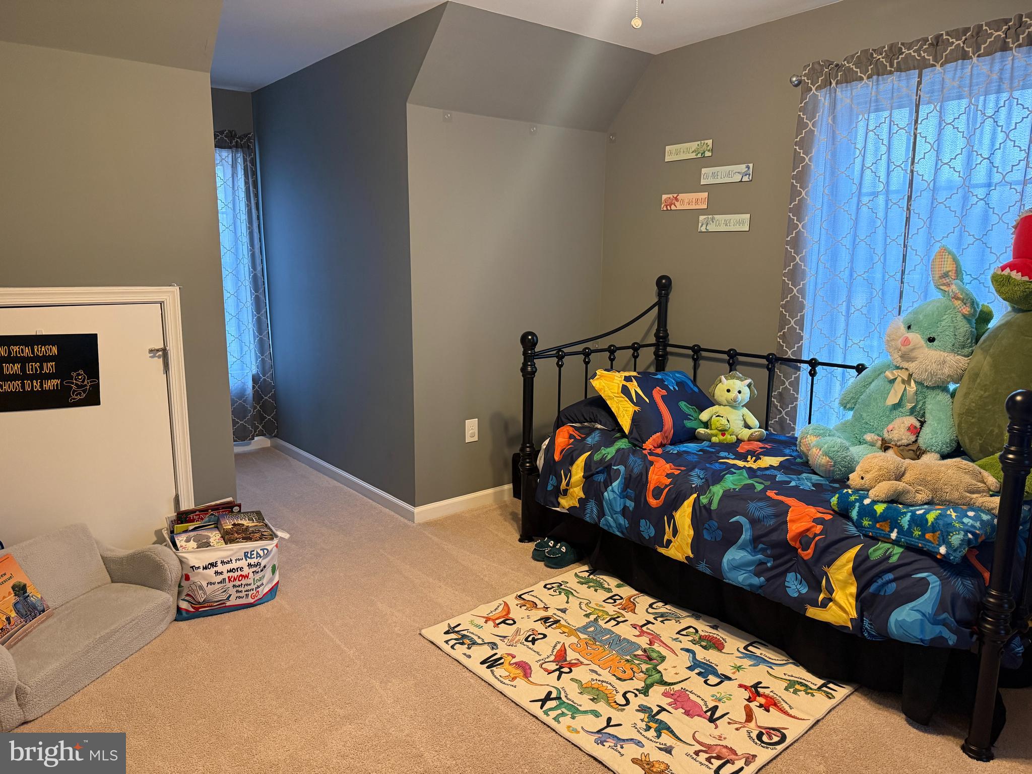 113 State Street Sharptown, MD 21861 - Photo 10 of 18 a bedroom with bed and a couch