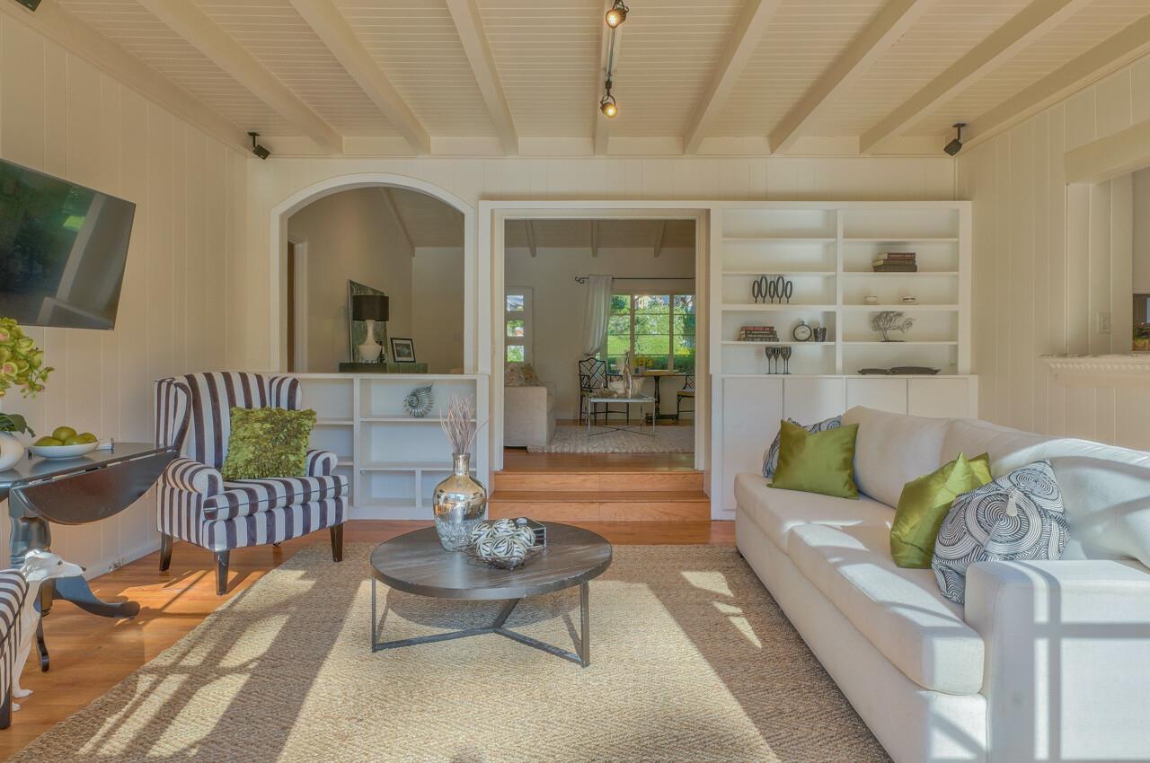 24770 Valley Way Carmel, CA 93923 - Photo 15 of 39 a living room with furniture and a wooden floor