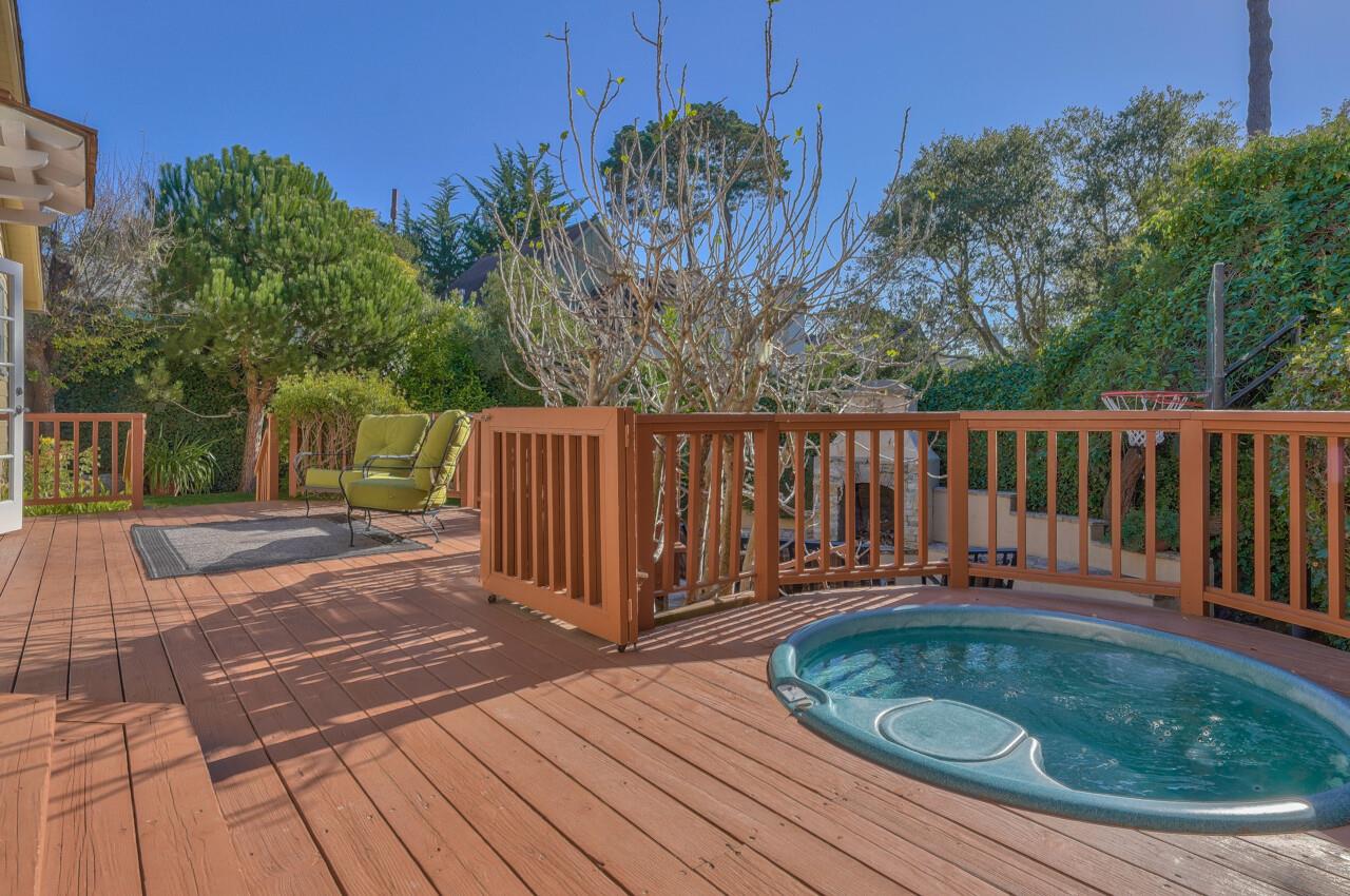 24770 Valley Way Carmel, CA 93923 - Photo 24 of 39 a backyard of a house with table and chairs