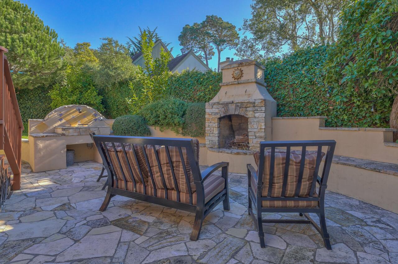 24770 Valley Way Carmel, CA 93923 - Photo 27 of 39 a view of a chairs and table in the patio