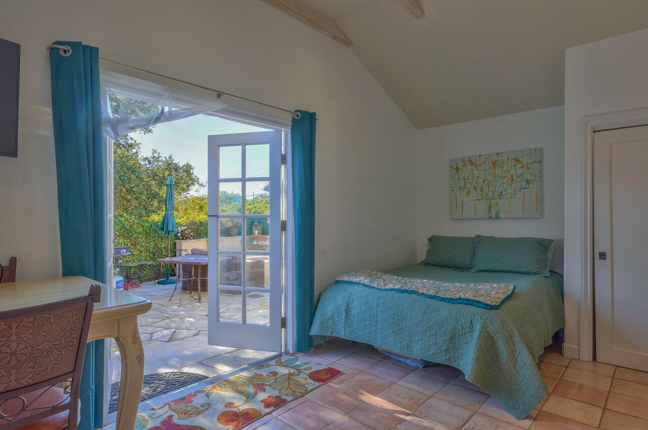 24770 Valley Way Carmel, CA 93923 - Photo 37 of 39 a bedroom with a bed and a window