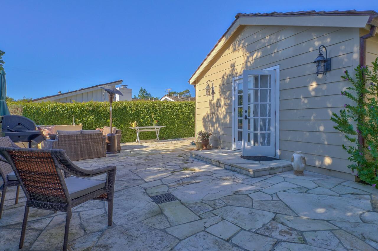 24770 Valley Way Carmel, CA 93923 - Photo 38 of 39 a view of a chair and table in backyard of the house