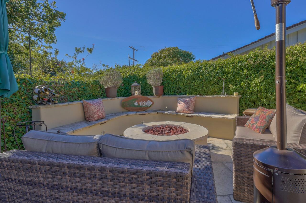24770 Valley Way Carmel, CA 93923 - Photo 39 of 39 a view of a patio with couches table and chairs and potted plants