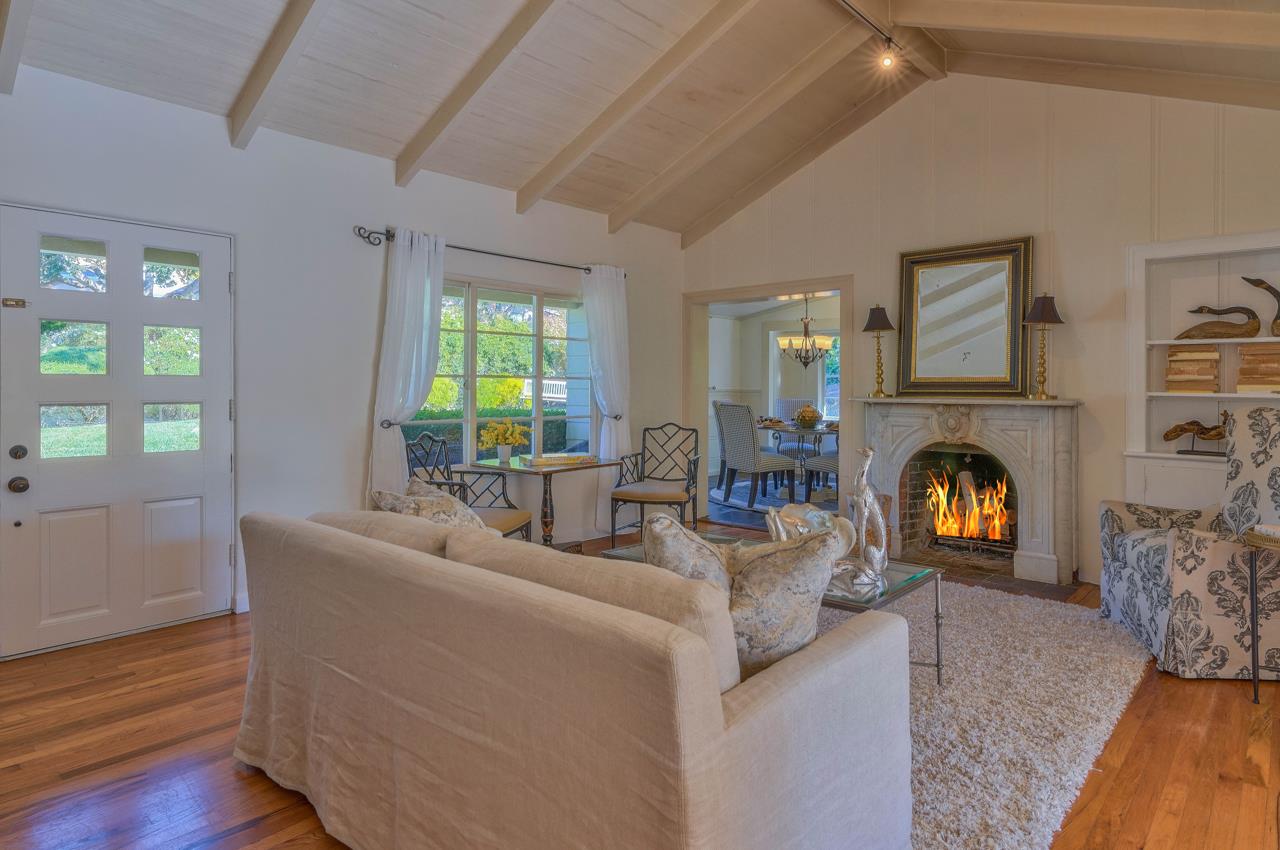 24770 Valley Way Carmel, CA 93923 - Photo 5 of 39 a living room with furniture and a fireplace