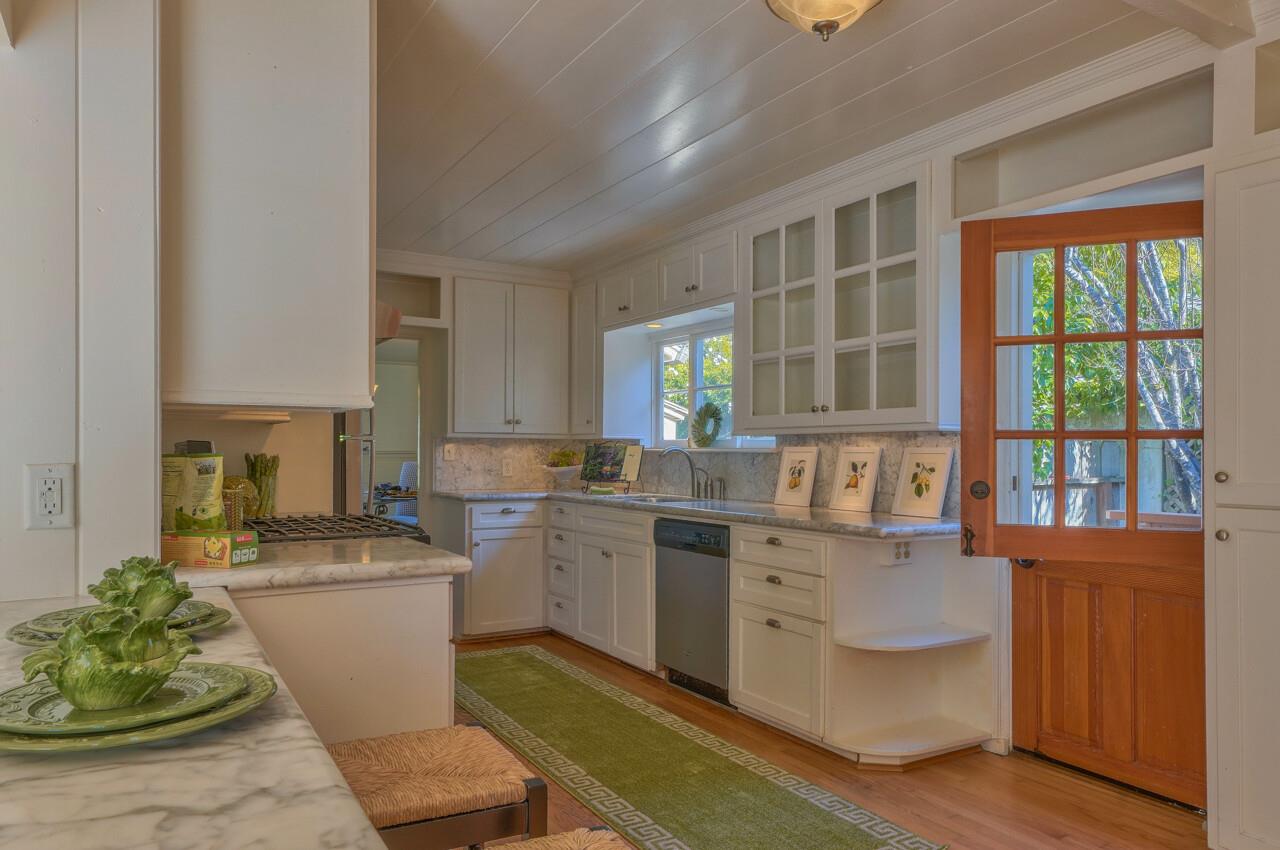 24770 Valley Way Carmel, CA 93923 - Photo 10 of 39 a kitchen with cabinets a sink and appliances