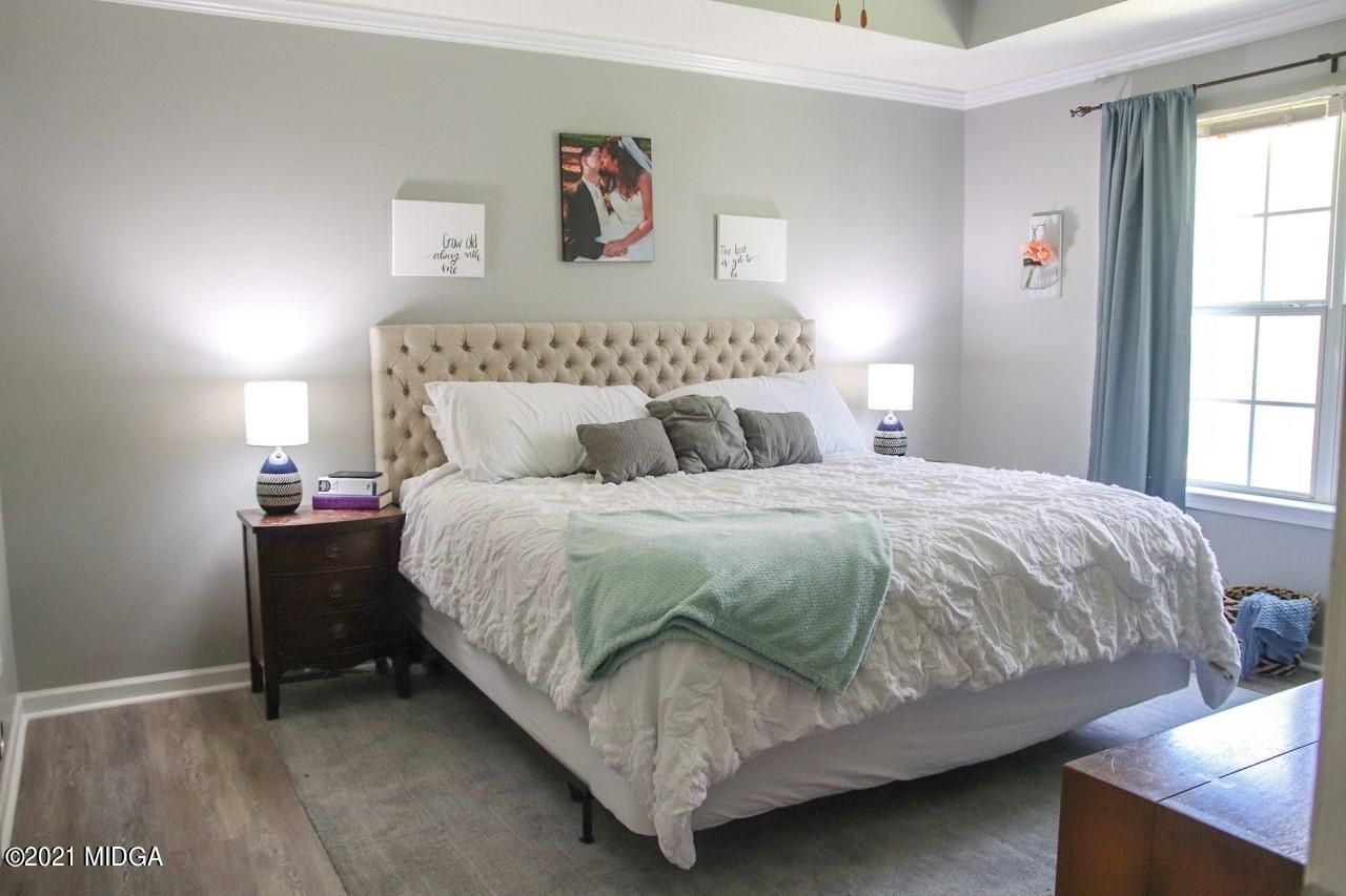 3369 Trotters Ridge Trail Gray, GA 31032 - Photo 7 of 13 a bedroom with a bed and window