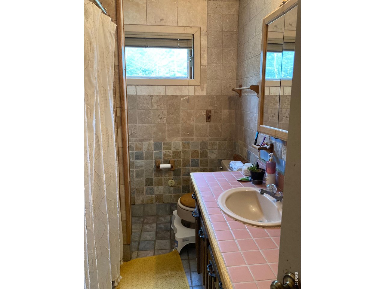 1064 Cold Springs Road Nederland, CO 80466 - Photo 8 of 48 a bathroom with a sink and a mirror