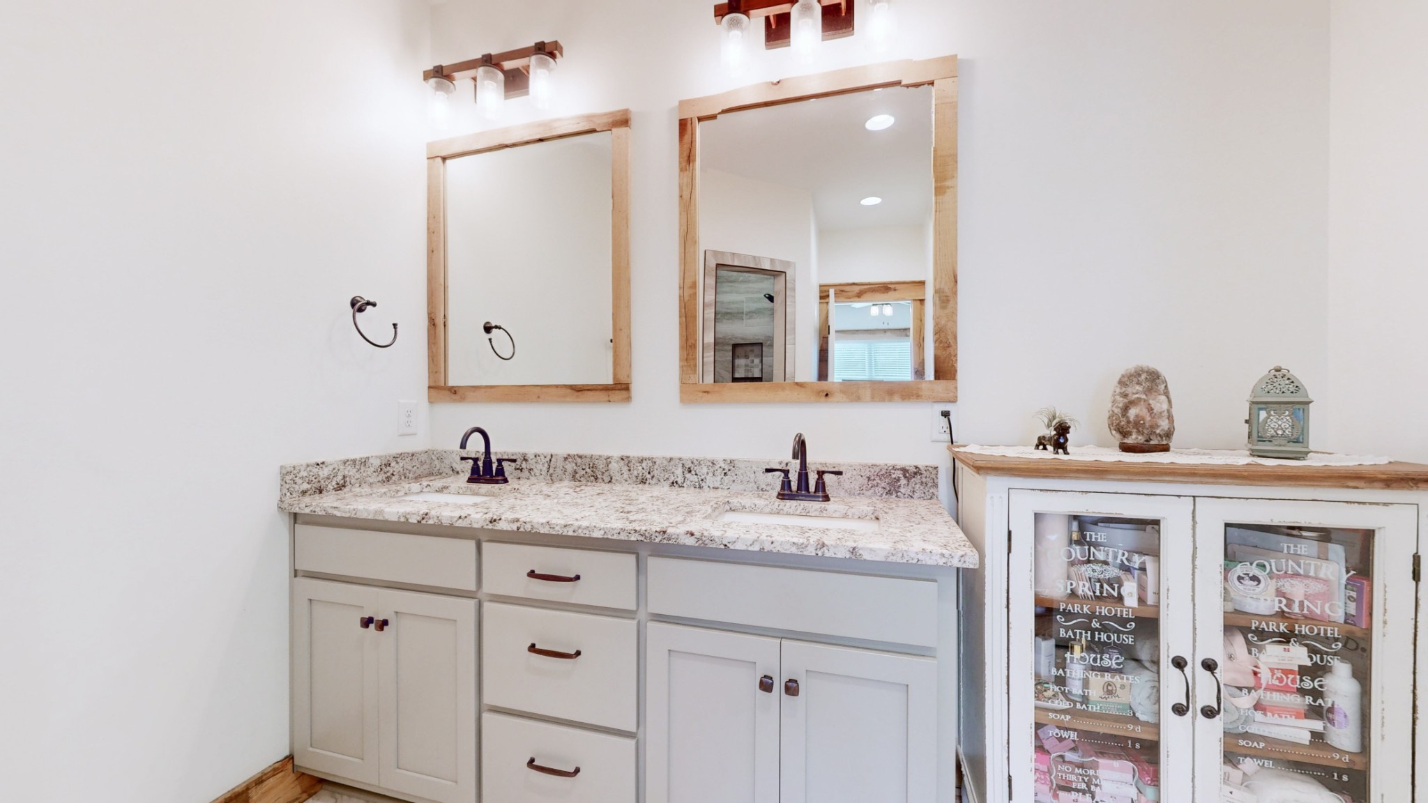 601 King Ridge Road Dowelltown, TN 37059 - Photo 26 of 49 a bathroom with a granite countertop sink and a mirror