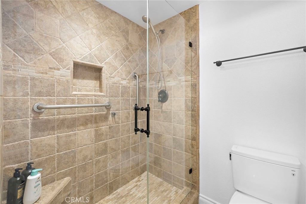 18 Navarre, Unit 133 Irvine, CA 92612 - Photo 14 of 32 a bathroom with a shower