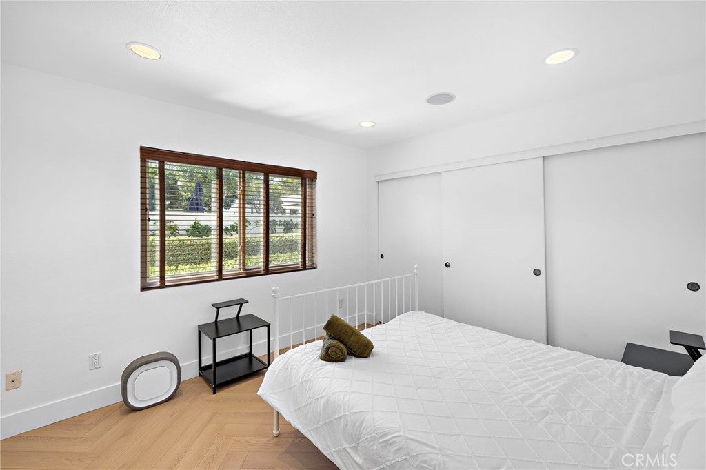 18 Navarre, Unit 133 Irvine, CA 92612 - Photo 16 of 32 a bedroom with a bed and window