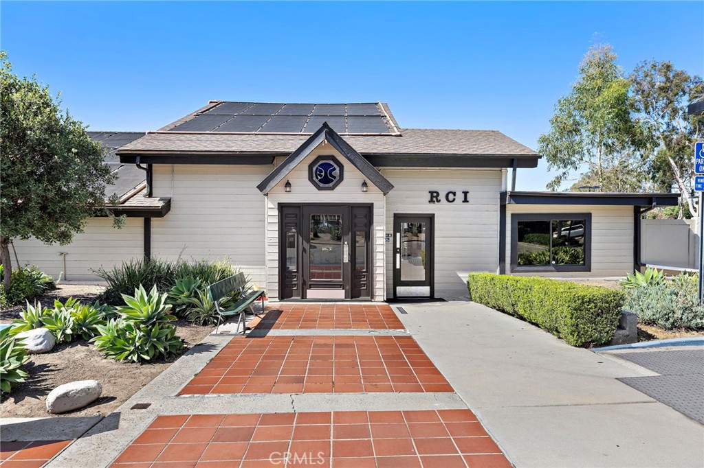 18 Navarre, Unit 133 Irvine, CA 92612 - Photo 28 of 32 a front view of a house with garden
