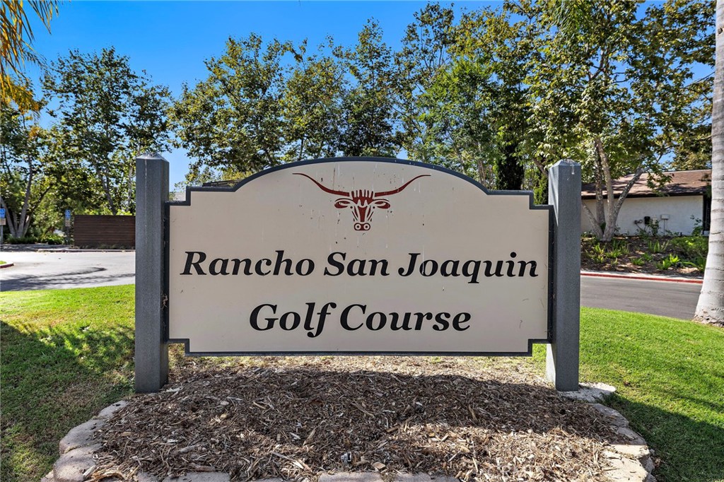 18 Navarre, Unit 133 Irvine, CA 92612 - Photo 29 of 32 a sign broad on the side of the road