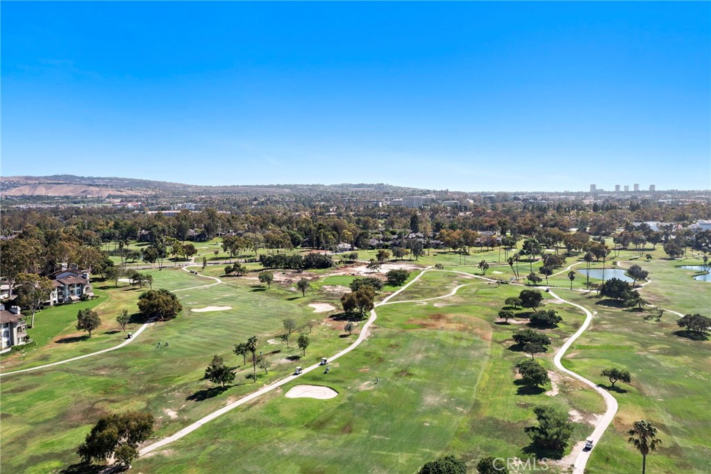 18 Navarre, Unit 133 Irvine, CA 92612 - Photo 31 of 32 an aerial view of residential houses with outdoor space and trees