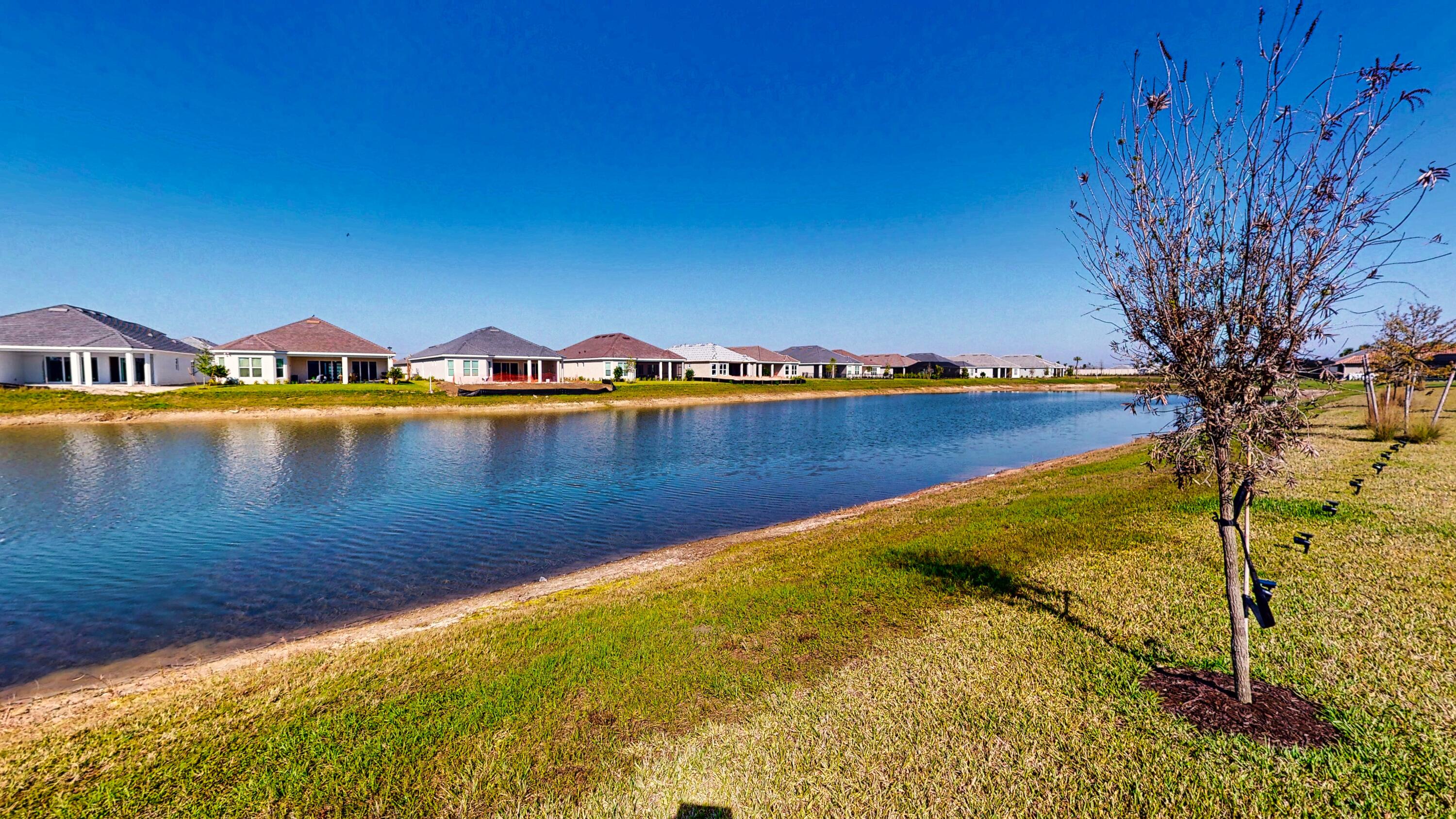 9876 Santini Road Port St. Lucie, FL 34987 - Photo 34 of 45 a view of an ocean with city view