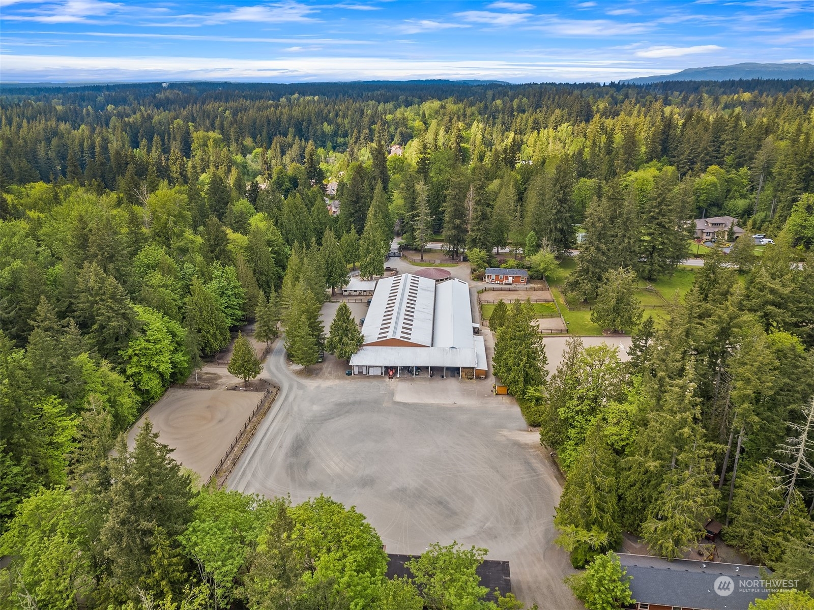 24221 Northeast Union Hill Road Redmond, WA 98053 - Photo 18 of 40 a view of a yard with an outdoor space