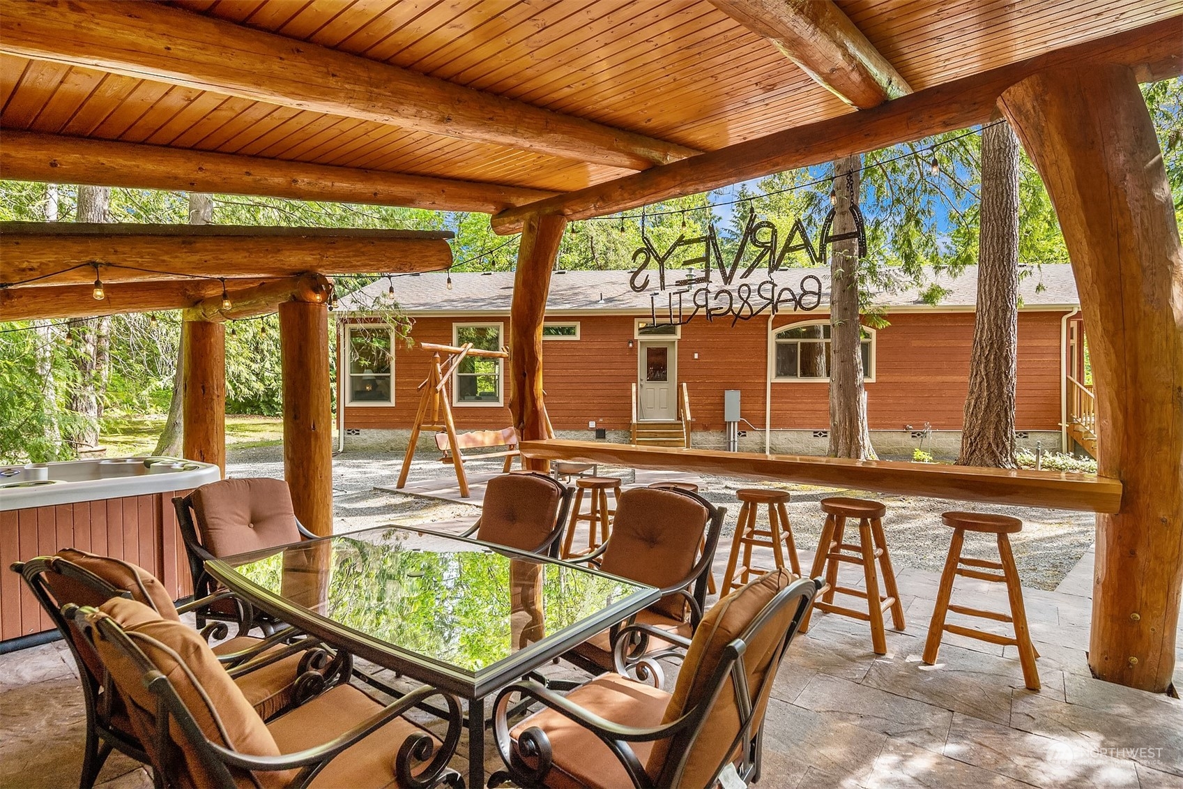 24221 Northeast Union Hill Road Redmond, WA 98053 - Photo 23 of 40 a dining room with furniture a rug and a large window