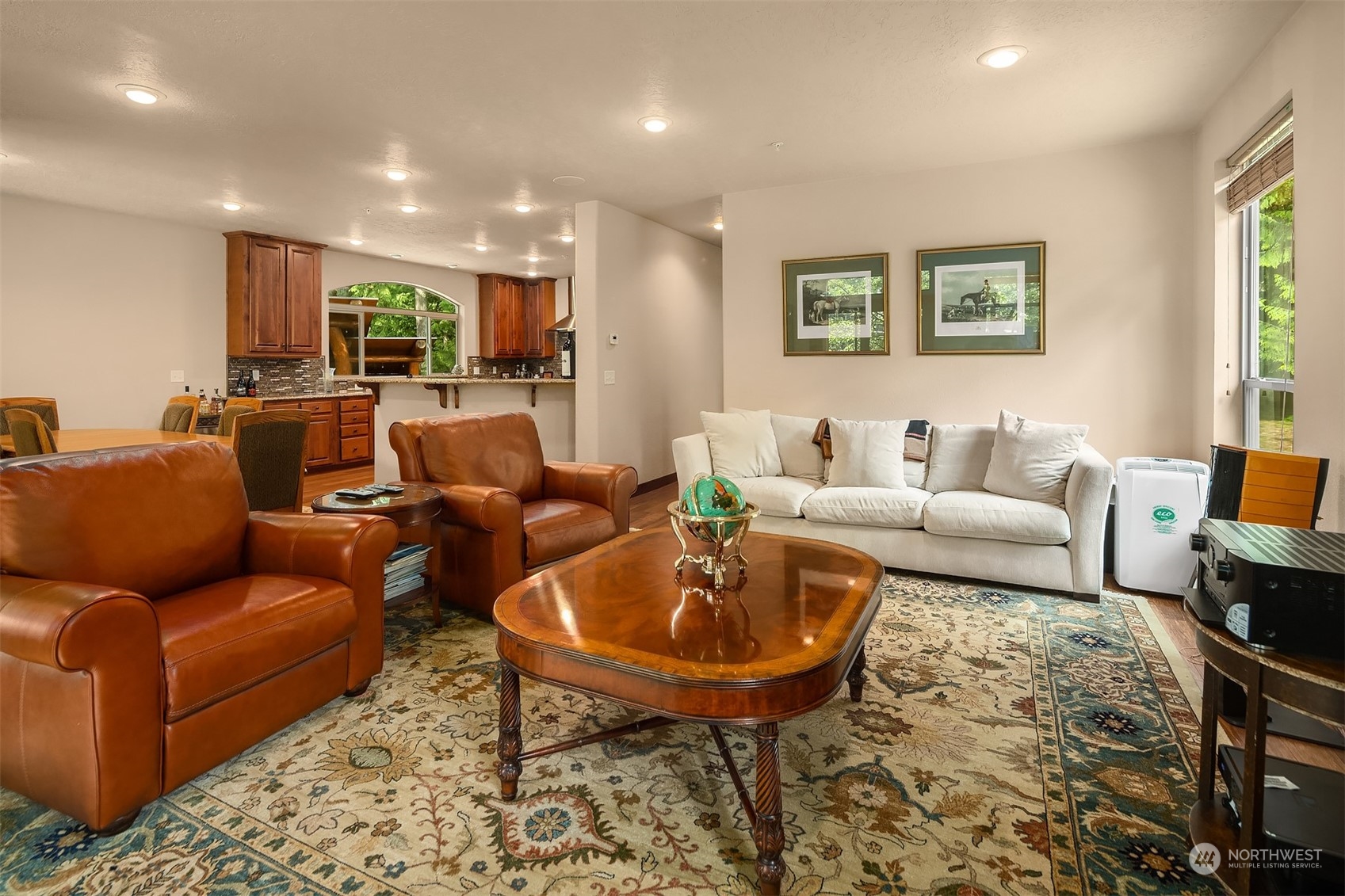 24221 Northeast Union Hill Road Redmond, WA 98053 - Photo 28 of 40 a living room with furniture and a wooden floor