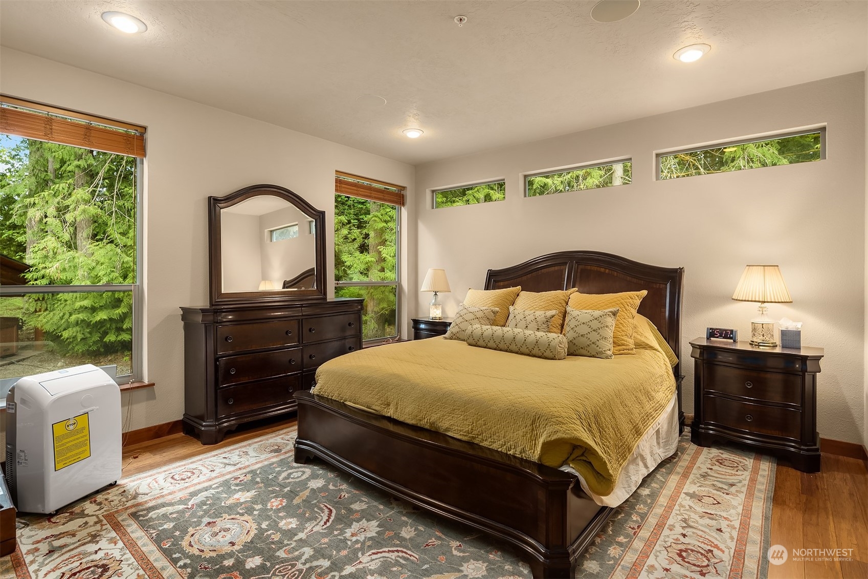 24221 Northeast Union Hill Road Redmond, WA 98053 - Photo 31 of 40 a bedroom with a bed and a dresser