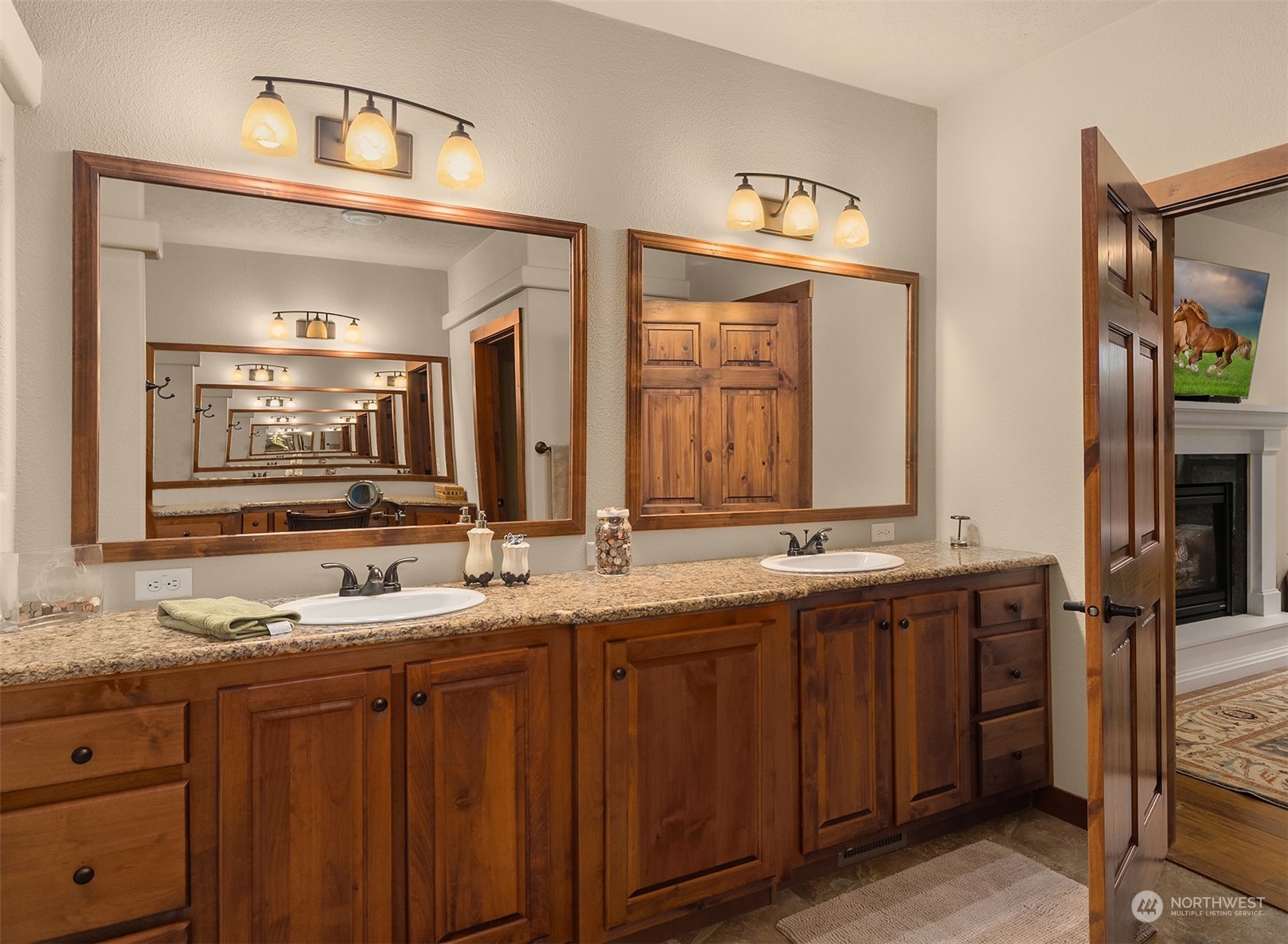 24221 Northeast Union Hill Road Redmond, WA 98053 - Photo 33 of 40 a bathroom with double vanity and a mirror