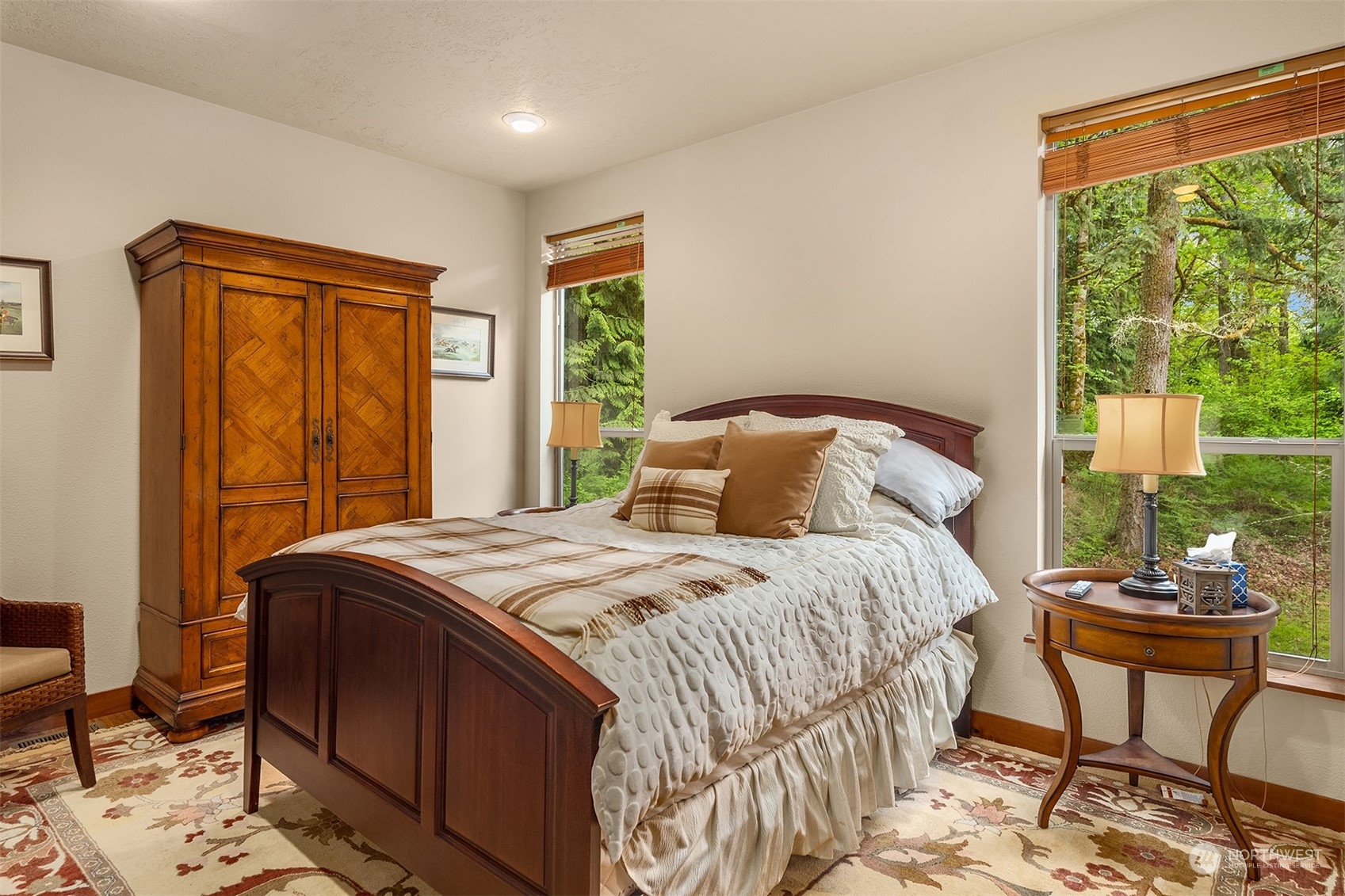 24221 Northeast Union Hill Road Redmond, WA 98053 - Photo 34 of 40 a bedroom with a bed and a window