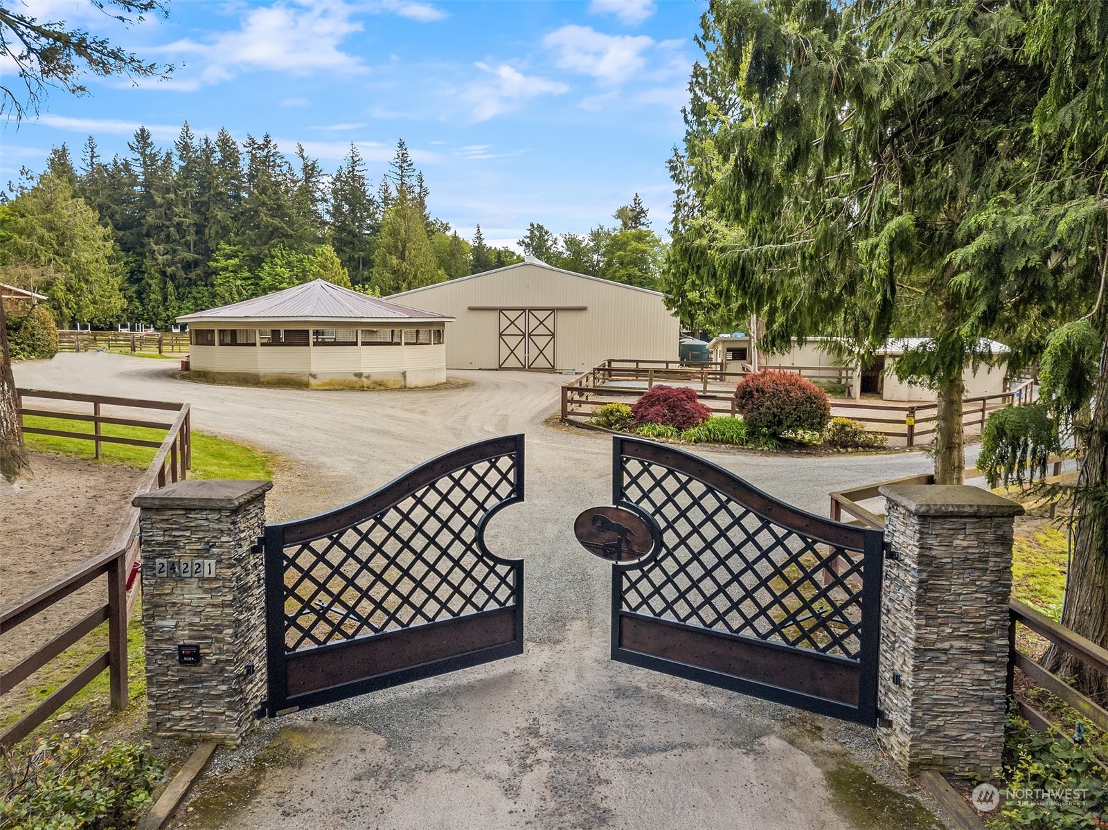 24221 Northeast Union Hill Road Redmond, WA 98053 - Photo 7 of 40 a view of a roof deck with couches and wooden fence