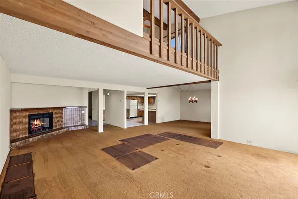 a view of a livingroom with a staircase