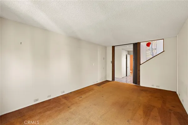 a view of a room with a large window