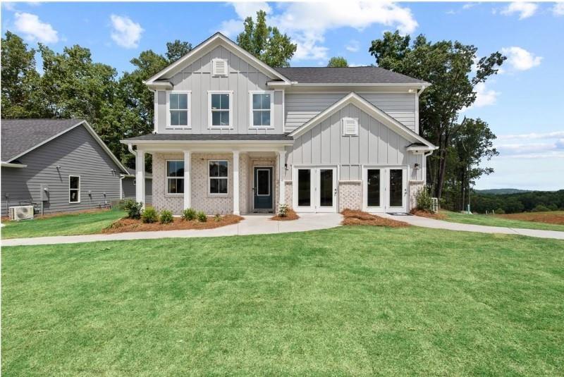 810 Tupelo Way Villa Rica, GA 30180 - Photo 2 of 41 a view of a yard in front of house