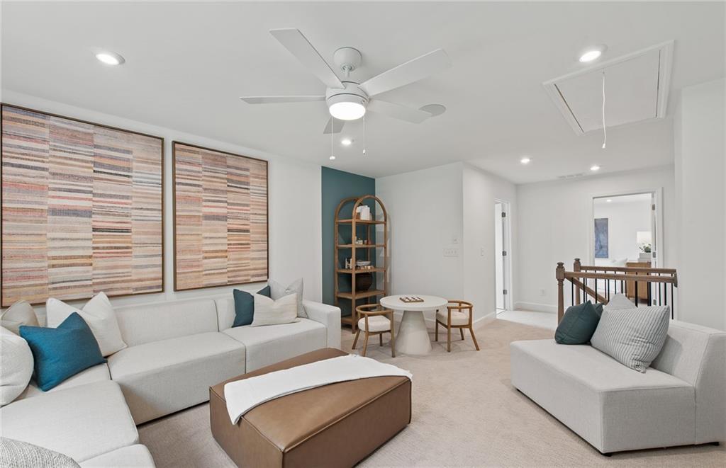 810 Tupelo Way Villa Rica, GA 30180 - Photo 33 of 41 a living room with furniture and a large window