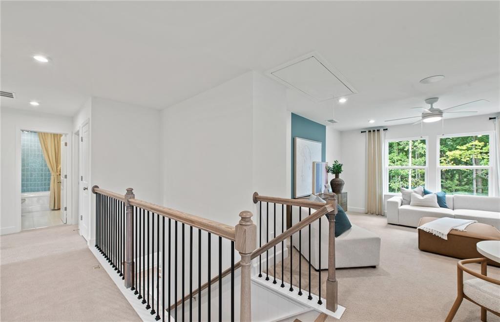 810 Tupelo Way Villa Rica, GA 30180 - Photo 34 of 41 a living room with furniture and a large window