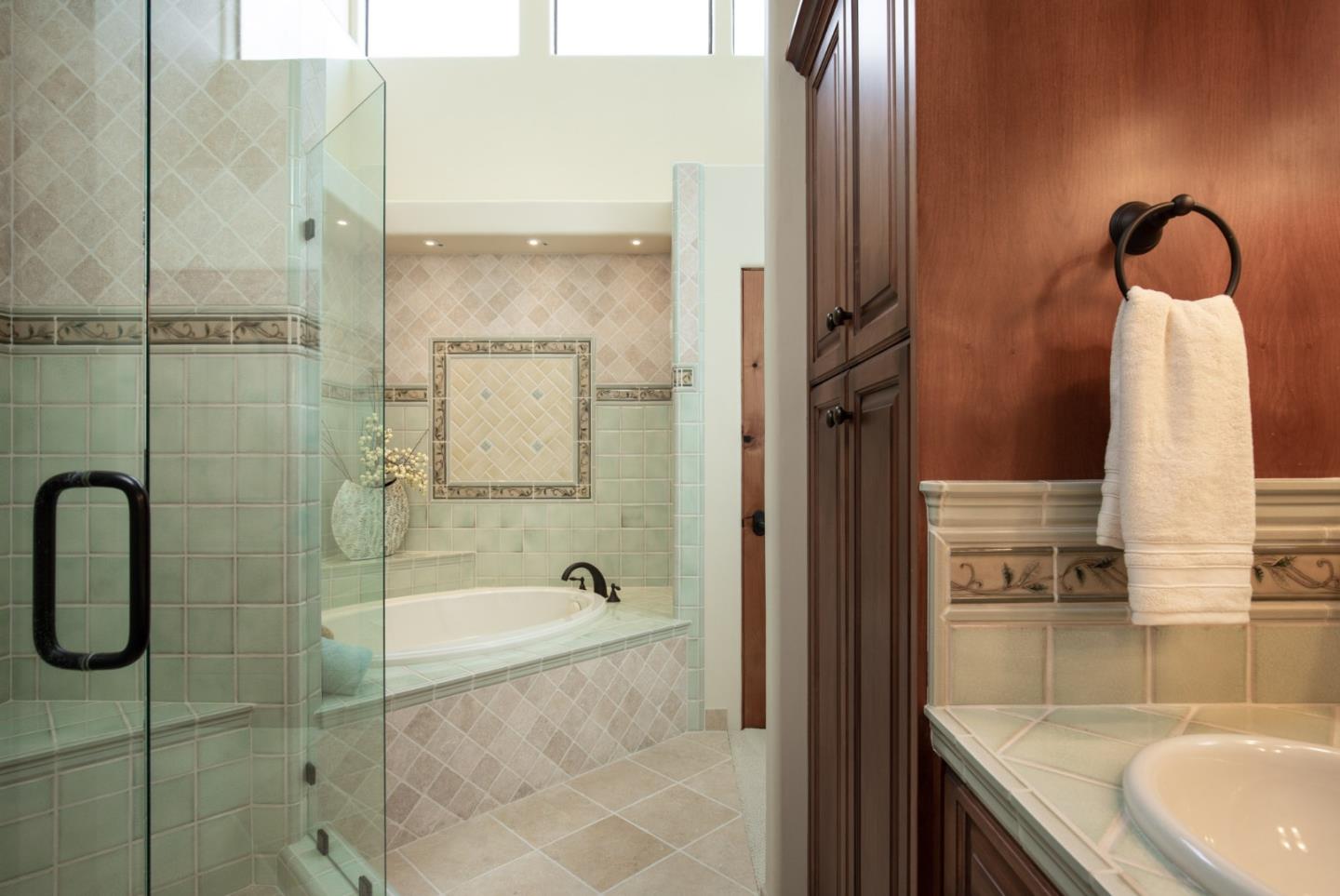 9546 Maple Court Carmel, CA 93923 - Photo 15 of 20 a bathroom with a shower and a sink