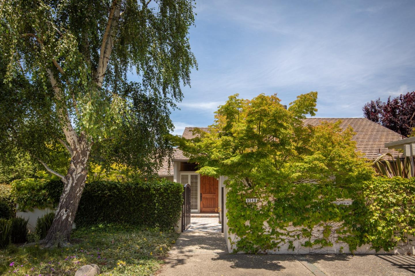 9546 Maple Court Carmel, CA 93923 - Photo 19 of 20 a front view of a house with a yard